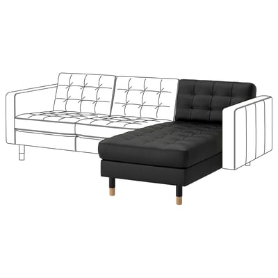 This image displays a black leather l-shaped MORABO chaise longue with a modern design. It is supported by wooden legs and a tufted pattern.