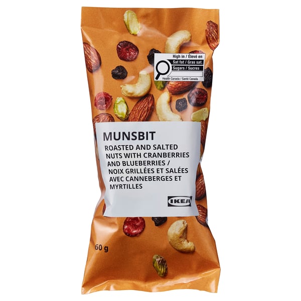 IKEA MUNSBIT bag: roasted, salted nuts with cranberries and blueberries. 60g, high in salt, sugars. Health canada warning label.