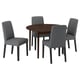Modern dark brown round dining table with four grey upholstered chairs. Simple, sleek design.
