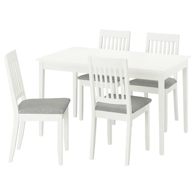 A white NÄSINGE dining set with a square table and four matching chairs.