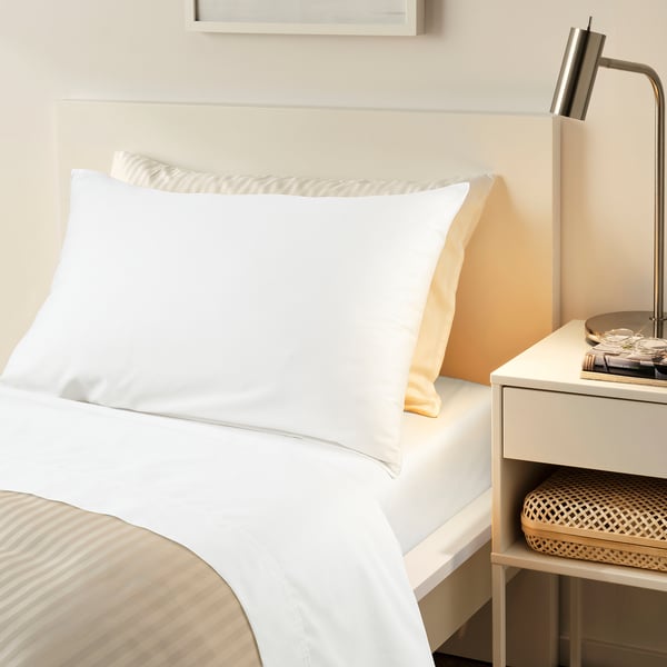 NATTJASMIN bedsheet set, white, cotton/lyocell, soft, neatly folded, smaller than pillows, simple design.