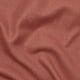 Close-up of textured, two-toned fabric, soft and inviting.