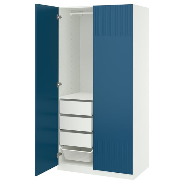 A white and blue PAX wardrobe. It a deep blue door with a milled surface and three shelves inside.