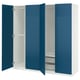 Blue ikea PAX wardrobe with open doors, white interior, shelves, and drawers.