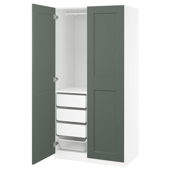 An open green and white PAX wardrobe with shelves and drawers.