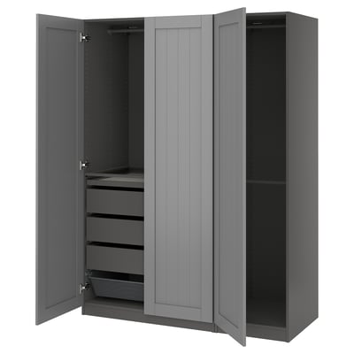 A grey PAX wardrobe with open doors, featuring drawers and shelves inside.