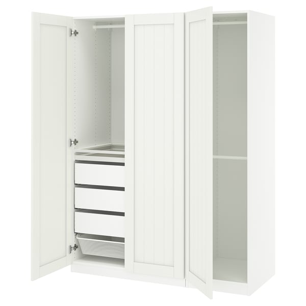 White PAX wardrobe with mesh basket, pull-out trays, and adjustable feet.