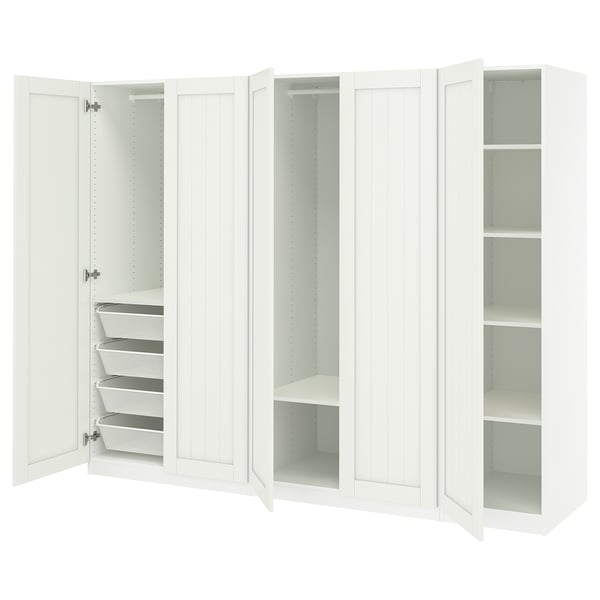 A white PAX wardrobe with shelves and mesh baskets.