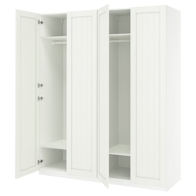 A white PAX wardrobe with open doors, revealing empty shelves and a hanging rod.