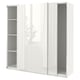 A white ikea PAX wardrobe with sliding glass doors and adjustable shelves.