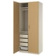 PAX wardrobe in oak. Tall, slim design with hanging space and three drawers, plus a mesh basket.