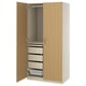 A PAX wardrobe in oak veneer with adjustable drawers and hanging space, perfect for any room.