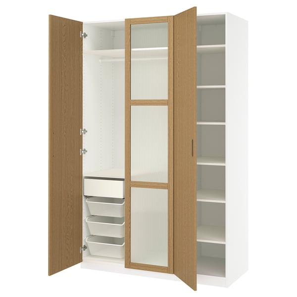An open white and light wood PAX wardrobe with shelves and drawers.