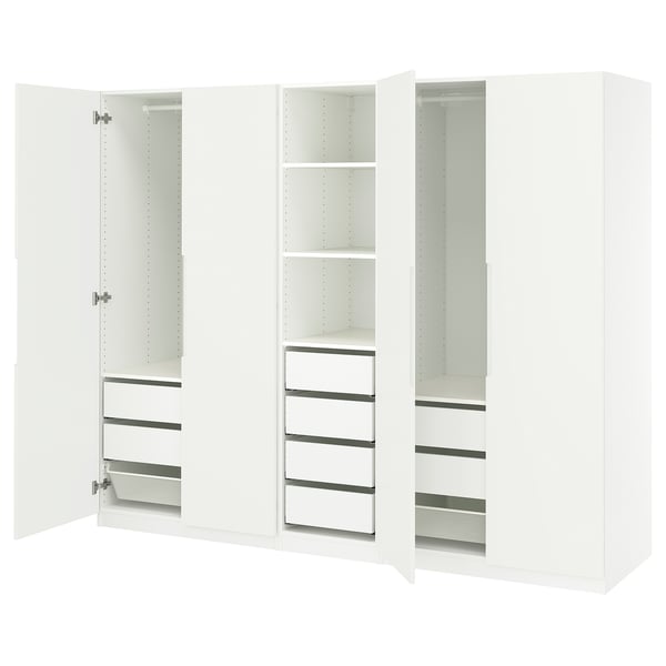 A white PAX wardrobe with open doors, revealing shelves and drawers.