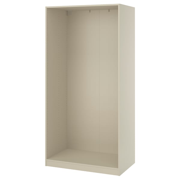 An ikea PAX wardrobe frame in beige. Its rectangular, foldable, and made of particleboard and fibreboard.