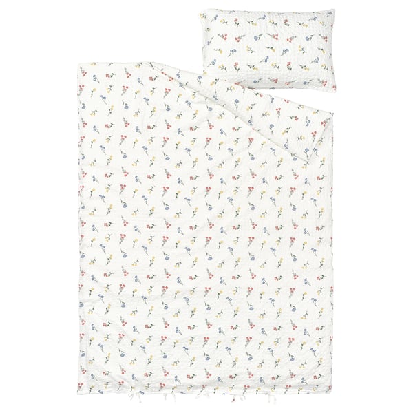 White floral bed set with duvet cover and pillowcase in cotton-viscose blend.