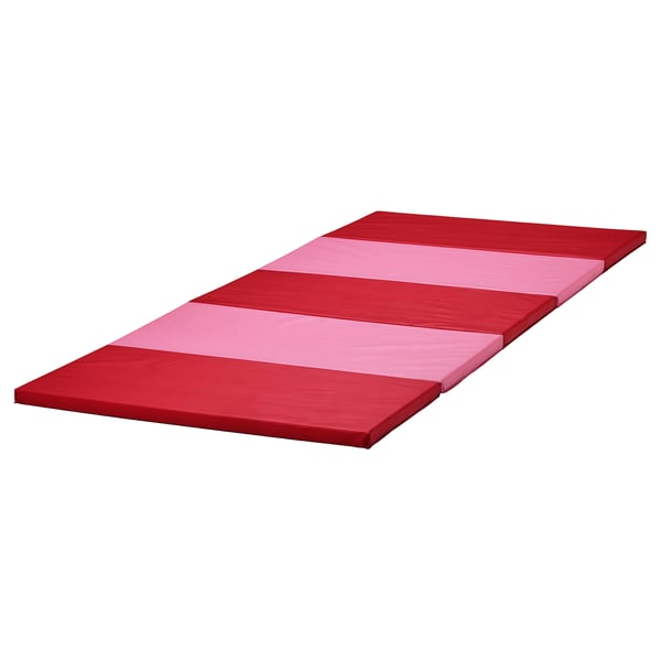 Red/pink PLUFSIG kids gym mat. Durable peva plastic & polyester. Great for acrobatics & motor skills.