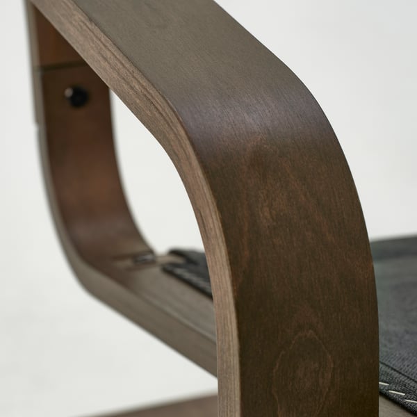 Dark wooden chair leg, smoothly curved and beautifully crafted. Sturdy and elegant design, showcasing fine wood grain texture.