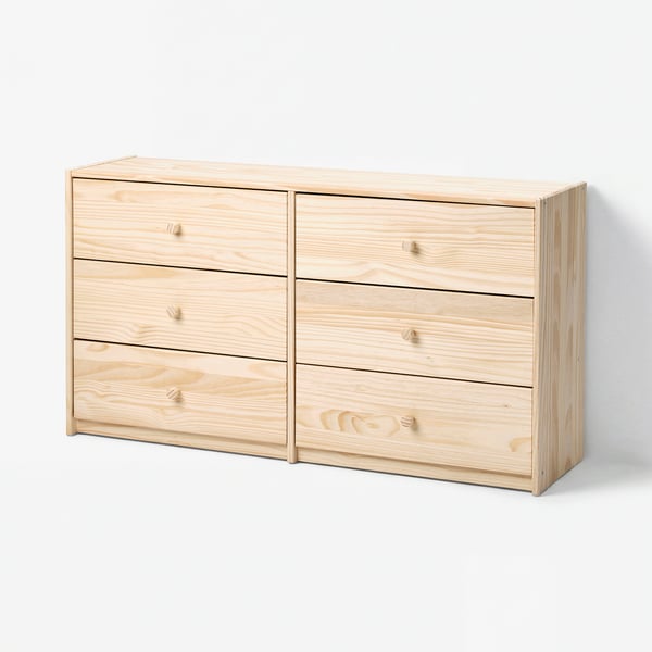 Wooden RAST dresser with 6 drawers, minimalist design for small spaces.