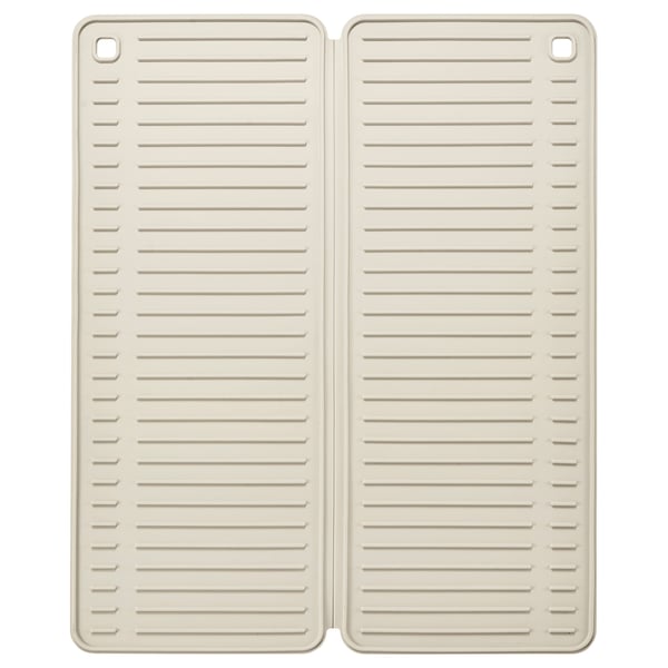 Two beige silicone mats with horizontal grooves placed side by side.