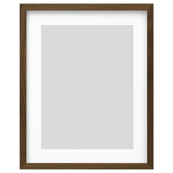Brown wooden RÖDALM picture frame with white mount.