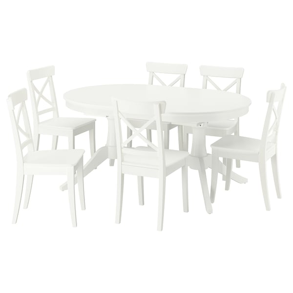 White ROSENTORP dining set: round extendable table with 6 matching chairs, solid wood and painted surfaces.