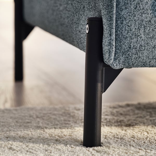 Modern sofa leg, slim & sturdy, textured grey fabric, quality design.