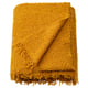 Mustard yellow recycled polyester throw blanket with fringed edges.