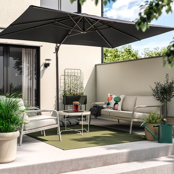 SEGLARÖ / IGGÖN Offset patio umbrella with base, anthracite/dark gray, 129 7/8x94 1/2 "