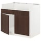 SEKTION kitchen unit. White frame, dark brown wood doors. Modern, sturdy design.