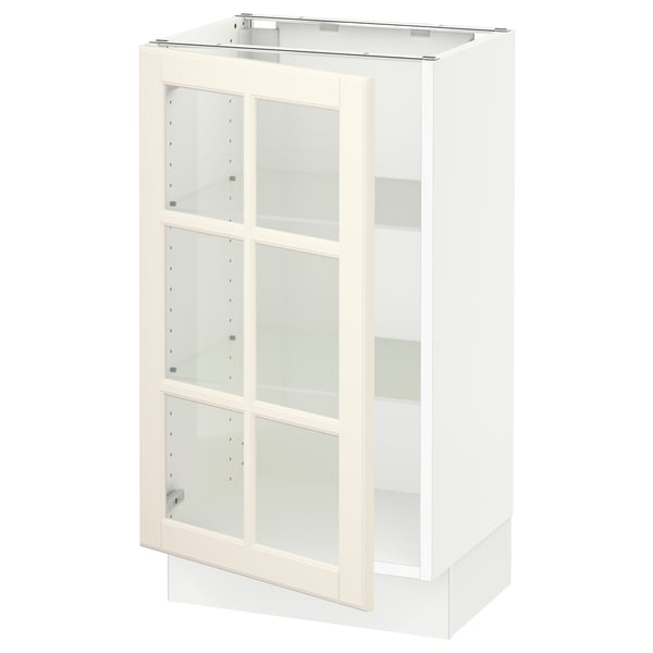 SEKTION kitchen cabinet, off-white glass doors, adjustable shelves, bevelled edges.