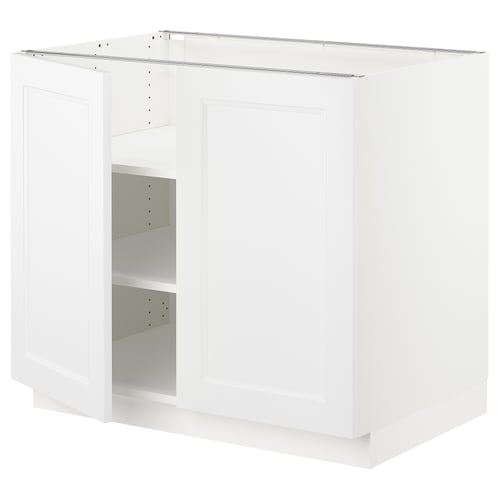 White SEKTION kitchen cabinet with adjustable shelves. Modern, square shape with flat panel design.