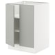 White kitchen cabinet from ikea with light grey door, two shelves, and adjustable hinges.