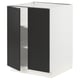 Ikea SEKTION kitchen unit in white with black doors, square shape, and modern design.