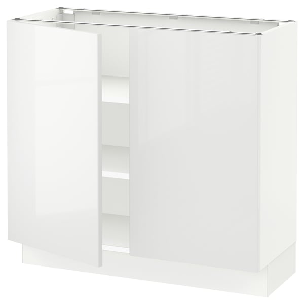 A white, high-gloss kitchen cabinet from IKEAs SEKTION line. It has three shelves and a sleek, modern design.