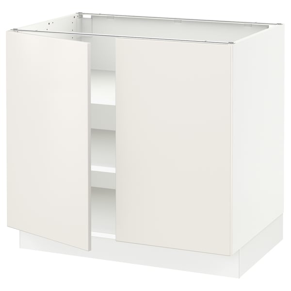 A SEKTION white kitchen cabinet without doors, highlighting its open shelving feature and sturdy frame construction.