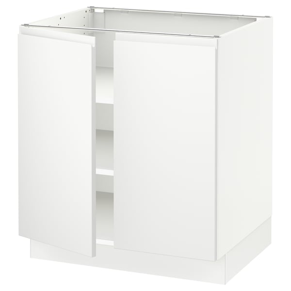 White ikea SEKTION kitchen cabinet with snap hinges, adjustable shelves, smooth door closure.