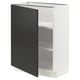 A white SEKTION kitchen cabinet with a black door and adjustable shelves.