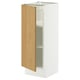 A white SEKTION bathroom cabinet with a light wooden door. It has an adjustable shelf inside and a sleek, modern design.
