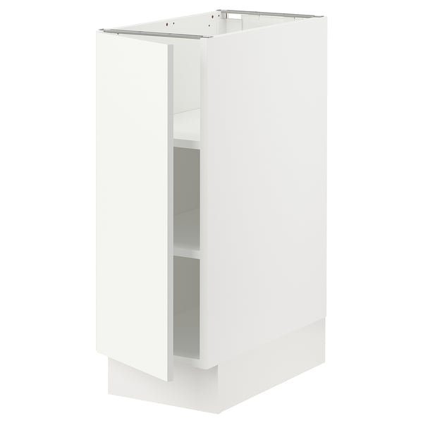 A white ikea SEKTION kitchen cabinet with a single door and adjustable shelves.