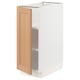 White kitchen cabinet with oak door, adjustable shelves.