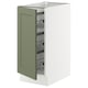 An open SEKTION kitchen cabinet in white with a green axstad door. It has wire storage baskets inside.