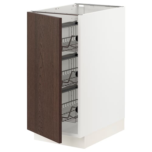 Ikea SEKTION white kitchen cabinet with dark brown wood door, wire baskets.