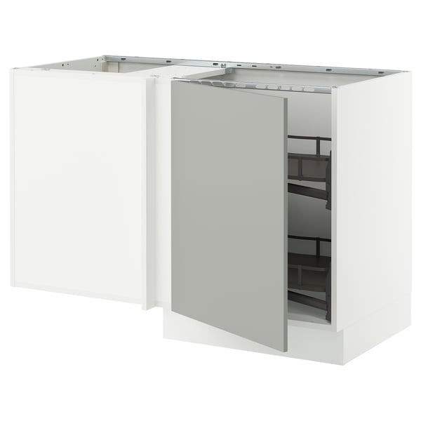 White l-shaped kitchen cabinet with open door, black shelves.