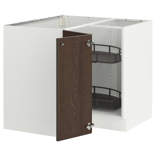 This image depicts a white SEKTION kitchen cabinet with dark brown sinarp wooden door and pull-out shelves.