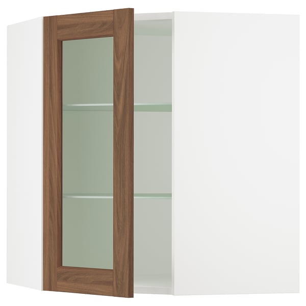 SEKTION kitchen cabinet with walnut foil doors and glass shelves.