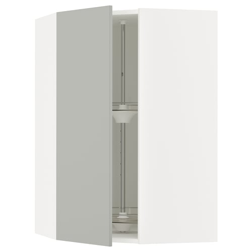 A SEKTION light grey kitchen cabinet with a carousel inside.