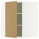 White SEKTION kitchen cabinet with oak door.
