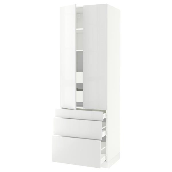 A white SEKTION tall kitchen unit with high-gloss drawers and cabinet doors. It a modern, sleek design with adjustable shelves.