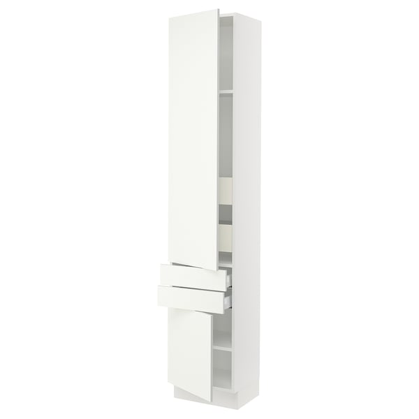 A tall, modern, white kitchen cabinet by IKEAs SEKTION system. Clean lines and a simple design with drawers and adjustable shelves.